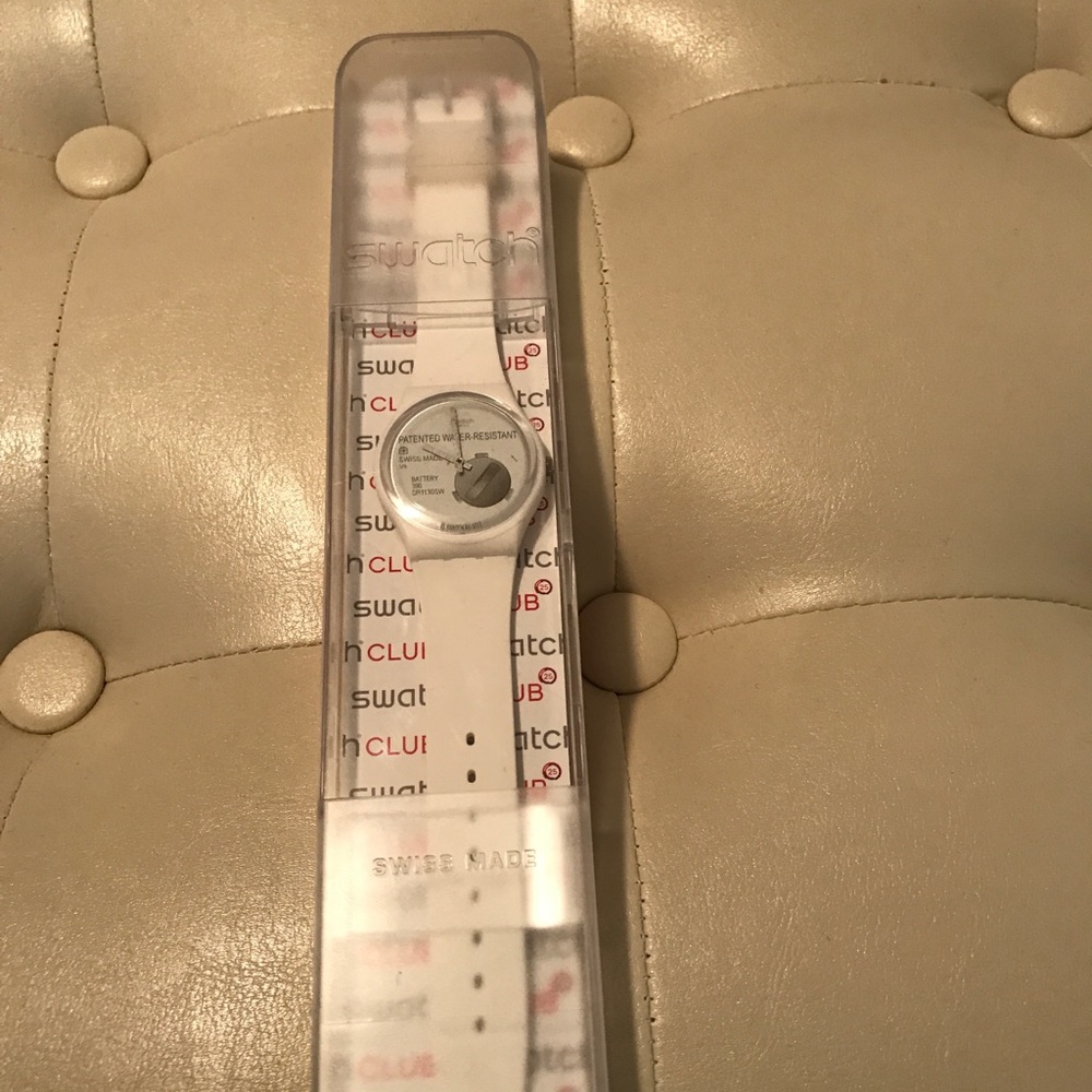 Brand new white Swatch watch. Unopened, in box.